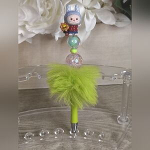 Charming Character Desk Accessory with Green Fur